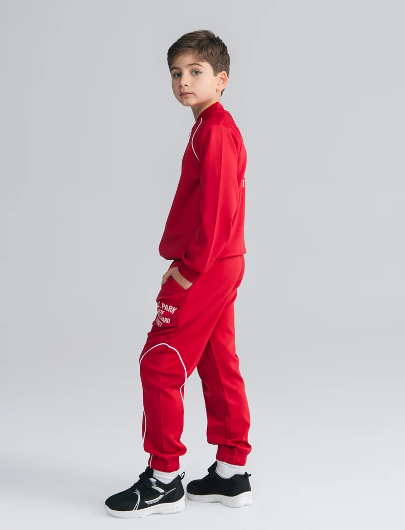 Jogger in felpa leggera con stampa frontale - Rosso india