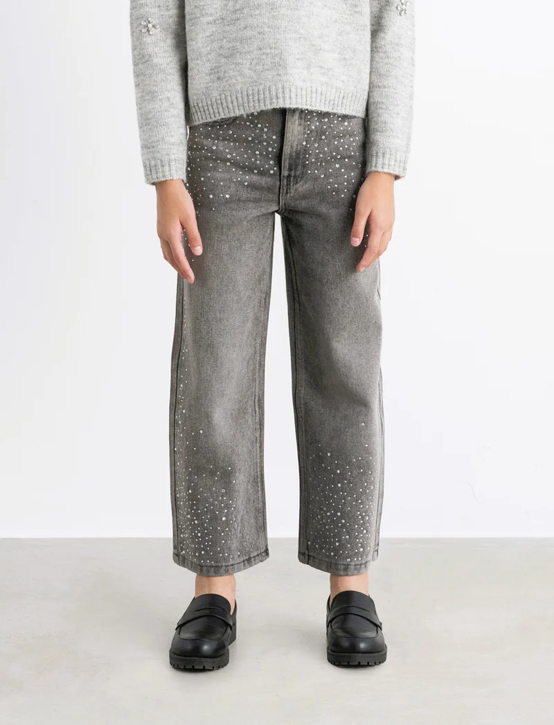 Jeans grigio gamba larga con strass. - Grigio