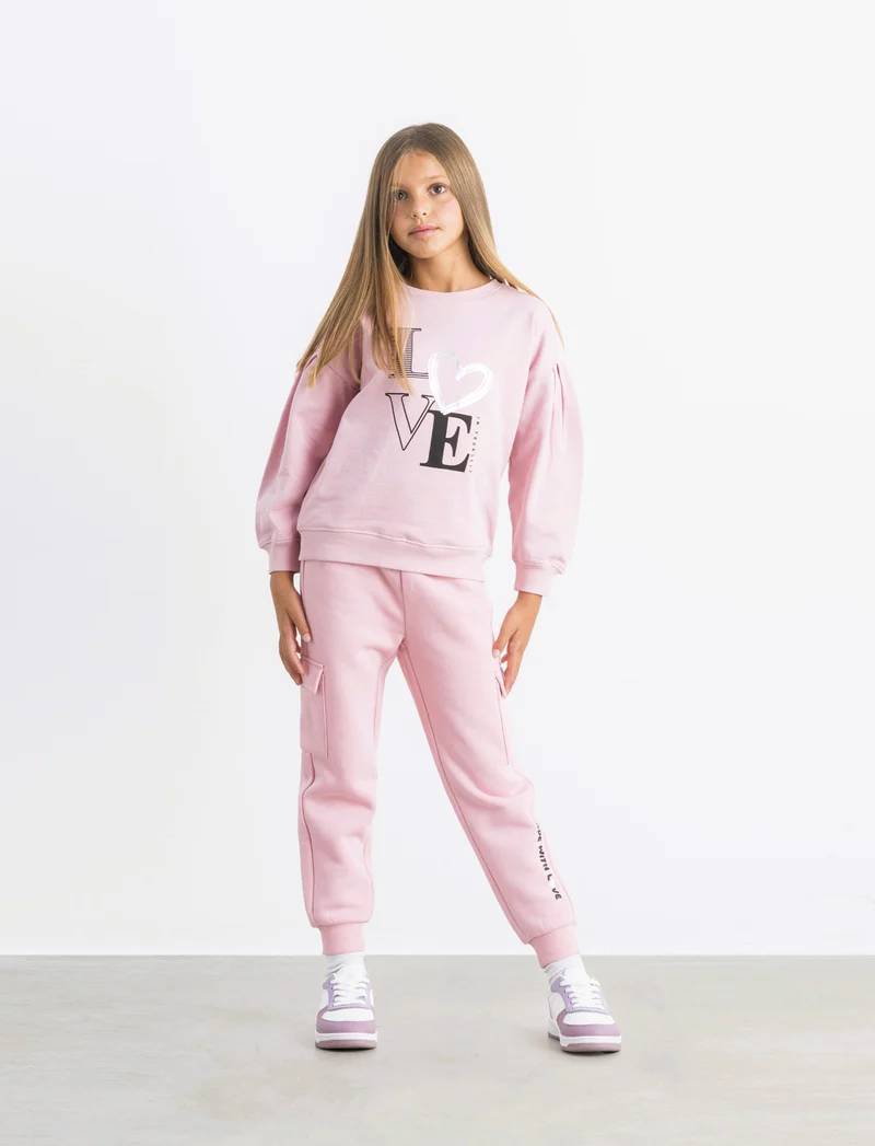 Pantaloni in felpa con tasconi. - Rosa