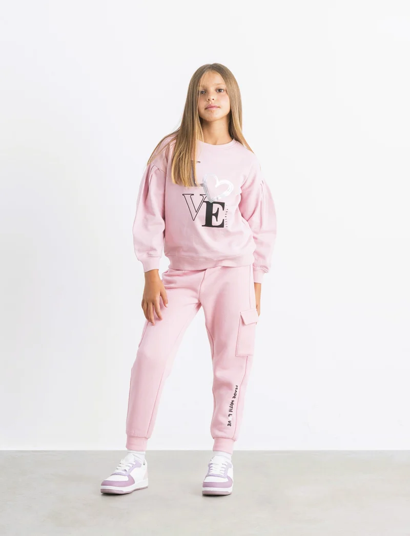 Pantaloni in felpa con tasconi. - Rosa