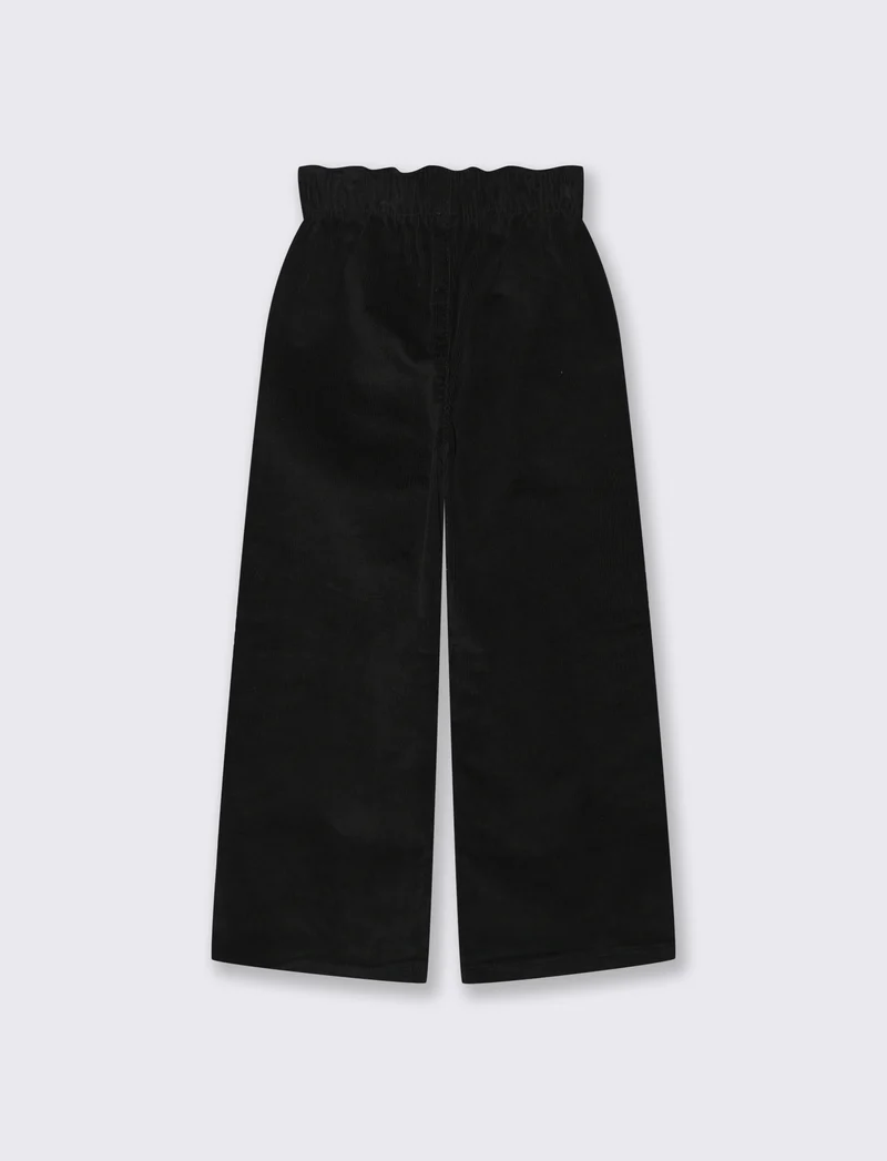 Pantaloni in velluto elastico a gamba larga. - Nero