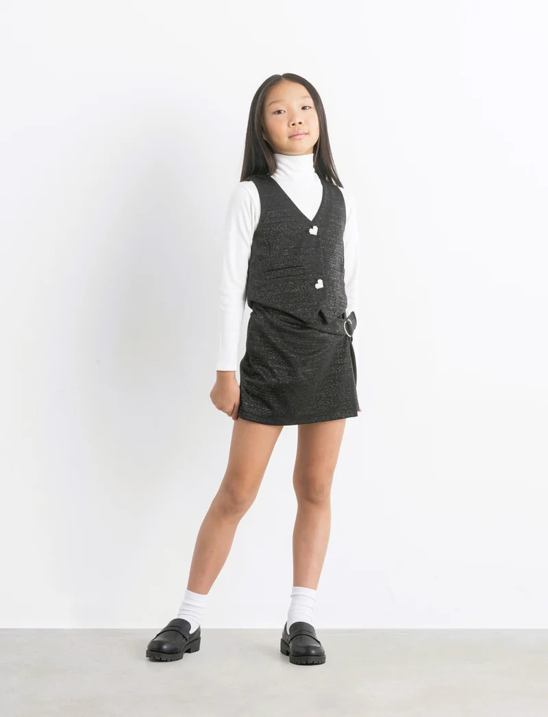 Gilet da bambina con bottoni gioiello. - Nero