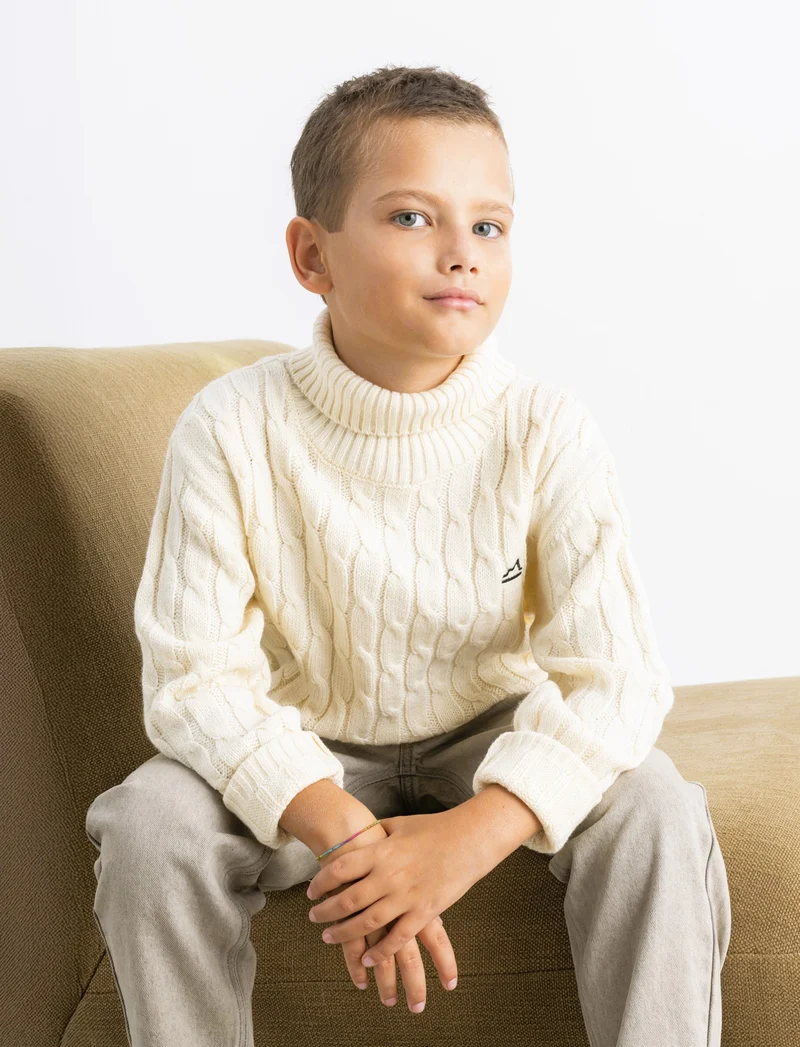 Maglia collo alto a traccia. - Beige