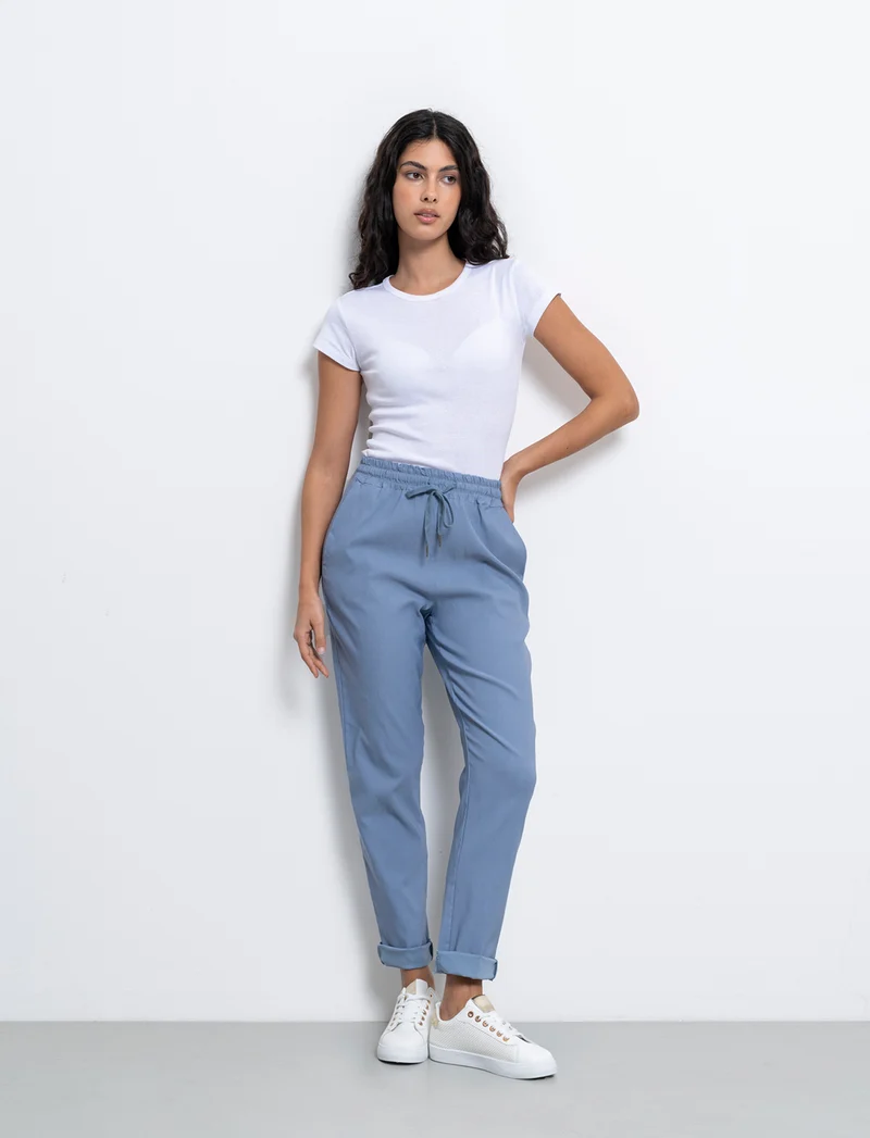 Pantalone in tessuto elasticizzato con coulisse in vita - Denim