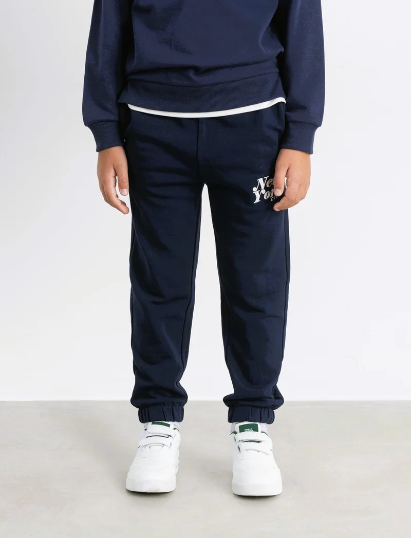 Jogger con ricamo college. - Blu