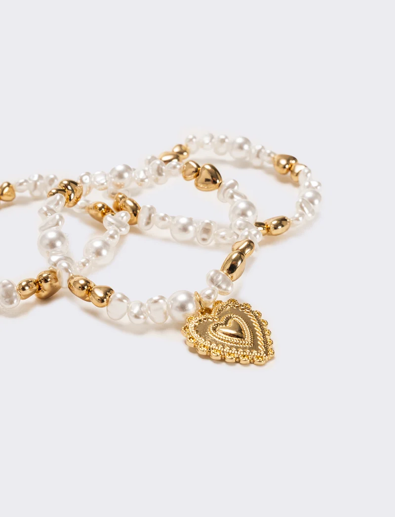 Bracciale tre fili perline elastico - Oro