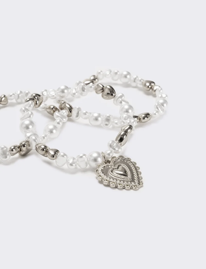 Bracciale tre fili perline elastico - Argento