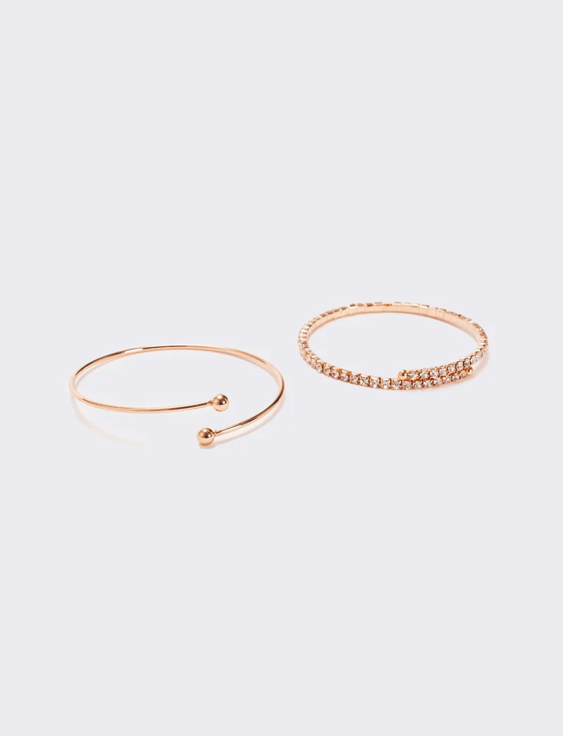 Due bracciali semirigidi con strass - Oro rosa