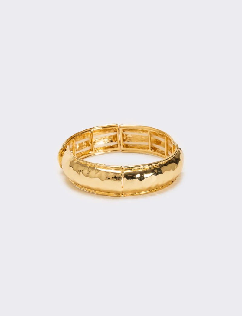 Bracciale elastico effetto martellato - Oro