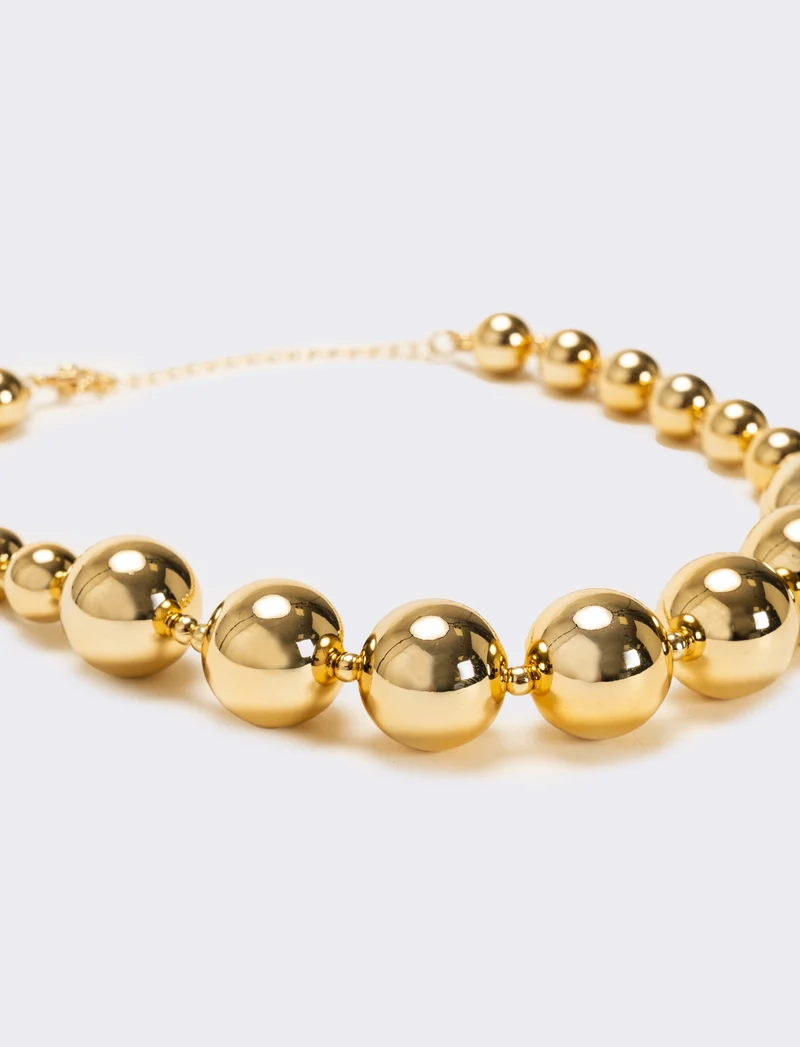Collana con perle metal di varie dimensioni - Oro