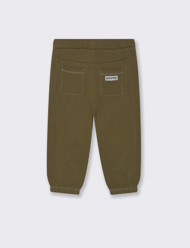 Jogger con impunture - Verde militare