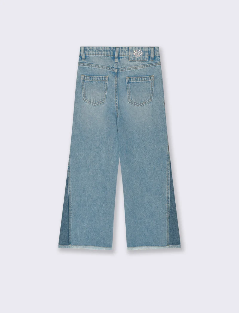 Jeans gamba larga da bambina con inserto laterale. - Denim