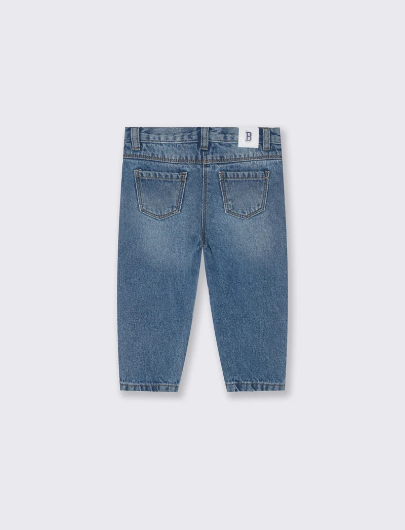 Jeans con impunture e riprese - Denim