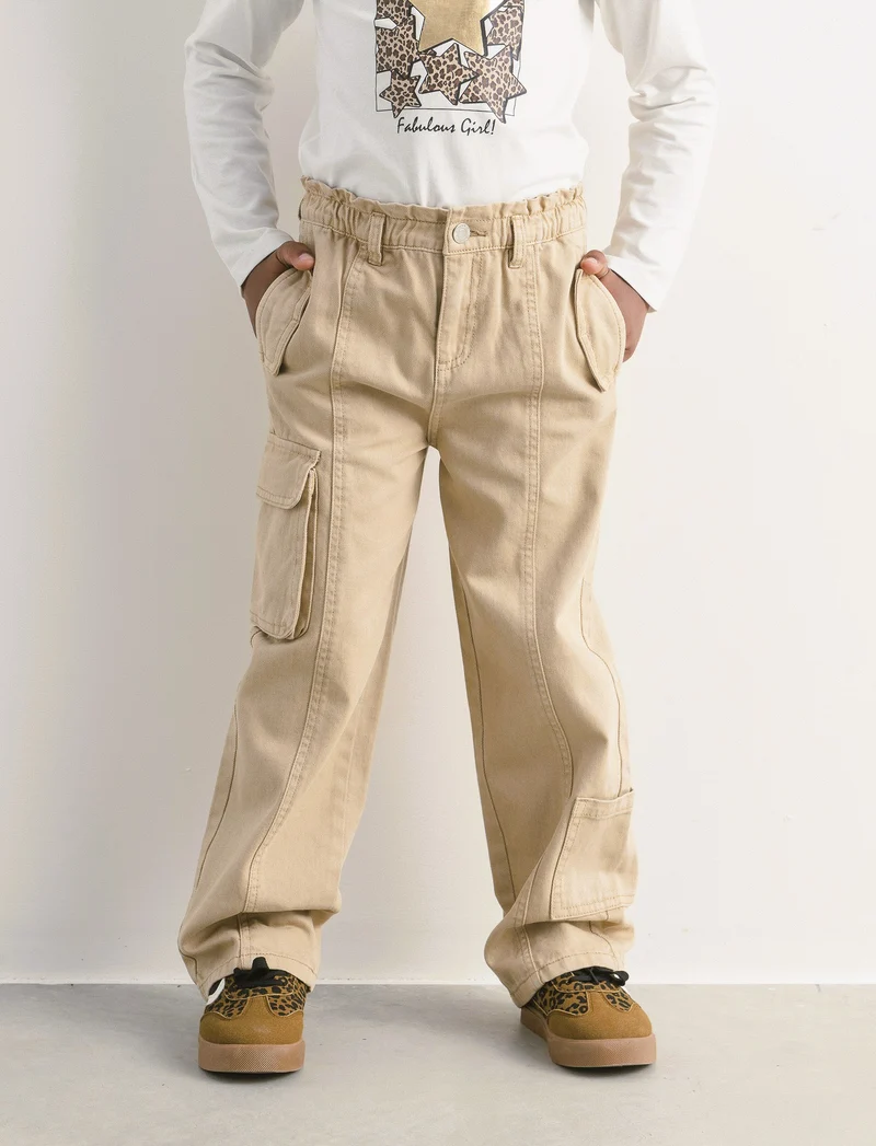 Pantaloni gamba ampia con tasche. - Beige