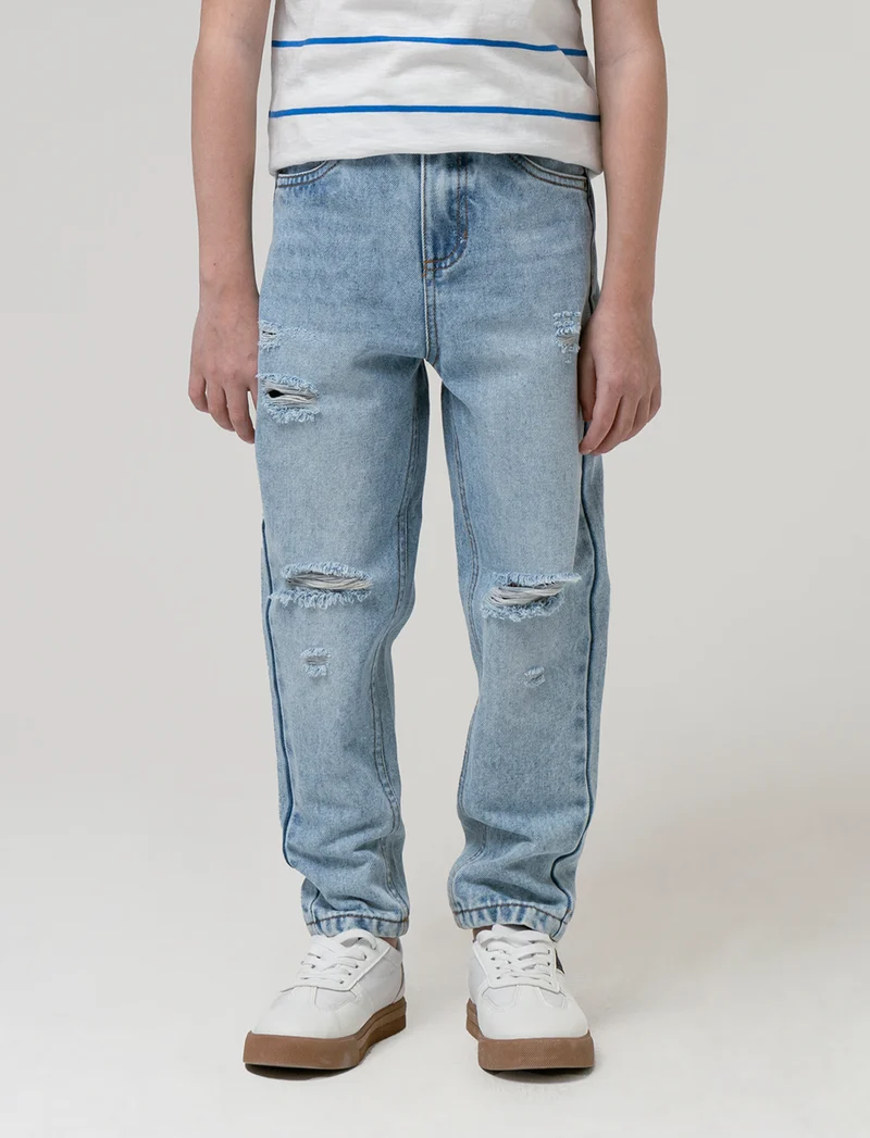 Jeans con rotture da bambino - Denim