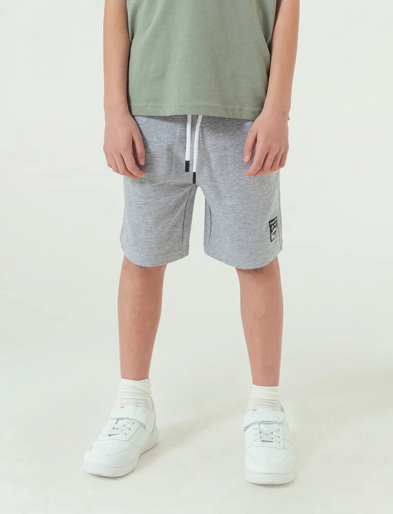 Bermuda fluo da bambino - Grigio mel.