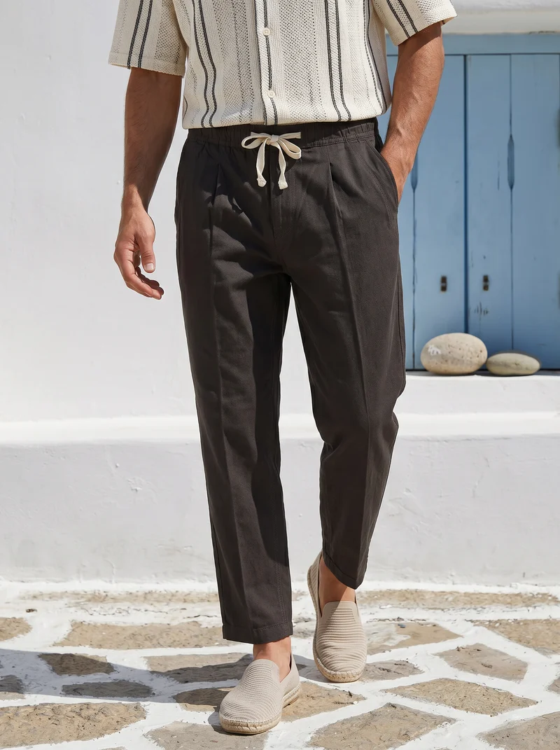 Pantaloni jogger in misto lino con tasche - Moro