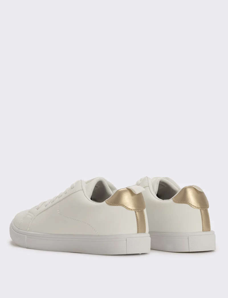 Sneakers bianche monocolore con platino - Bianco