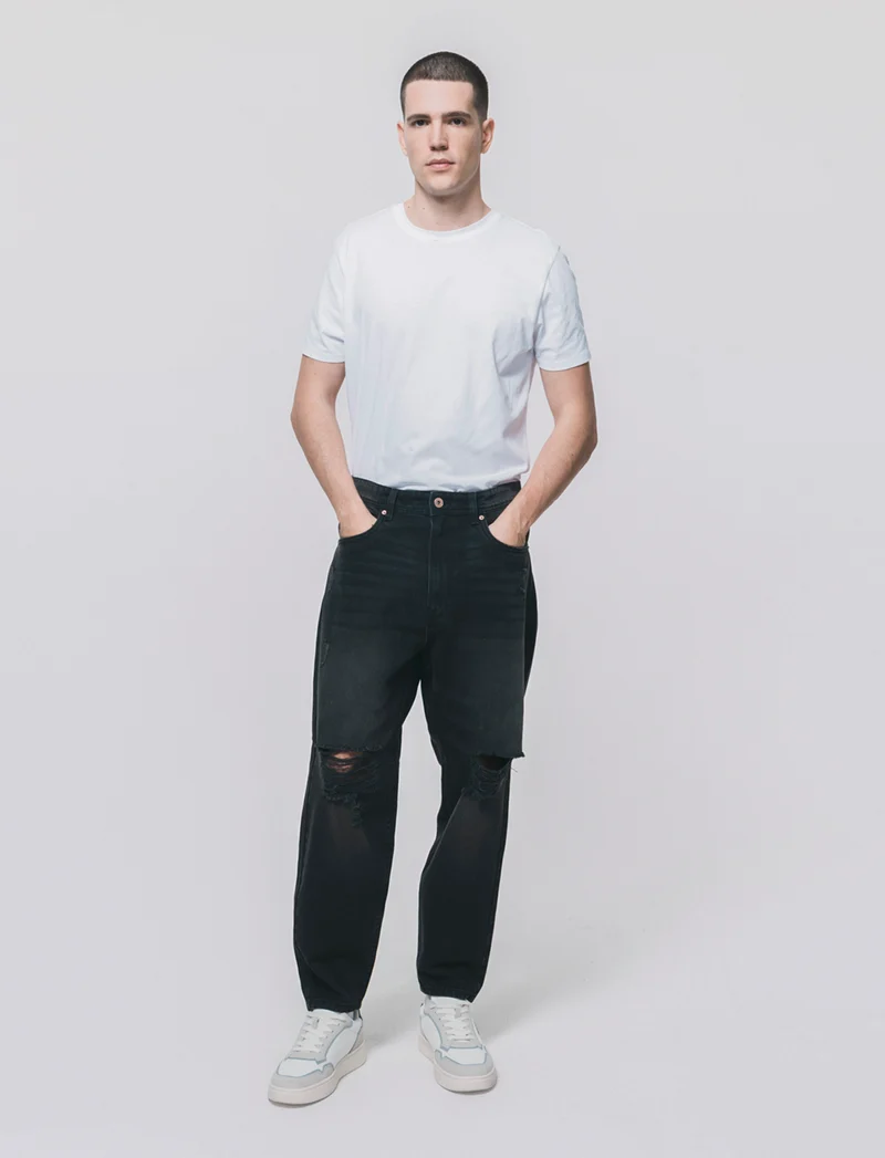 Jeans nero loose fit con strappi - Nero