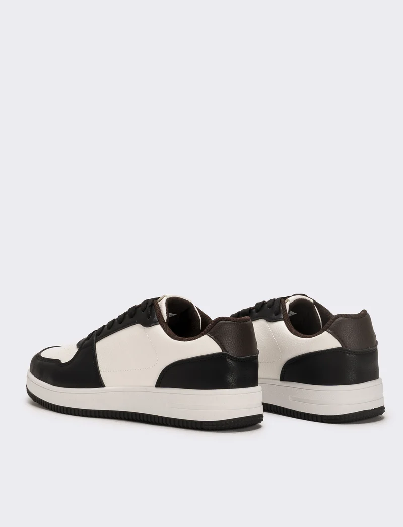 Sneakers con inserti a contrasto da uomo - Nero