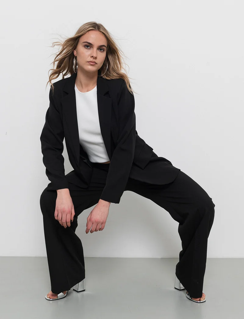 Pantalone palazzo con tessuto fluido - Nero