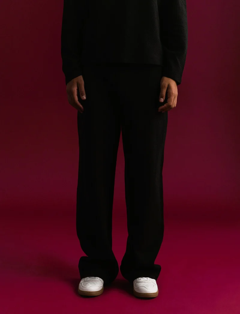 PANTALONI JOGGER IN TESSUTO GOFFRATO - Nero