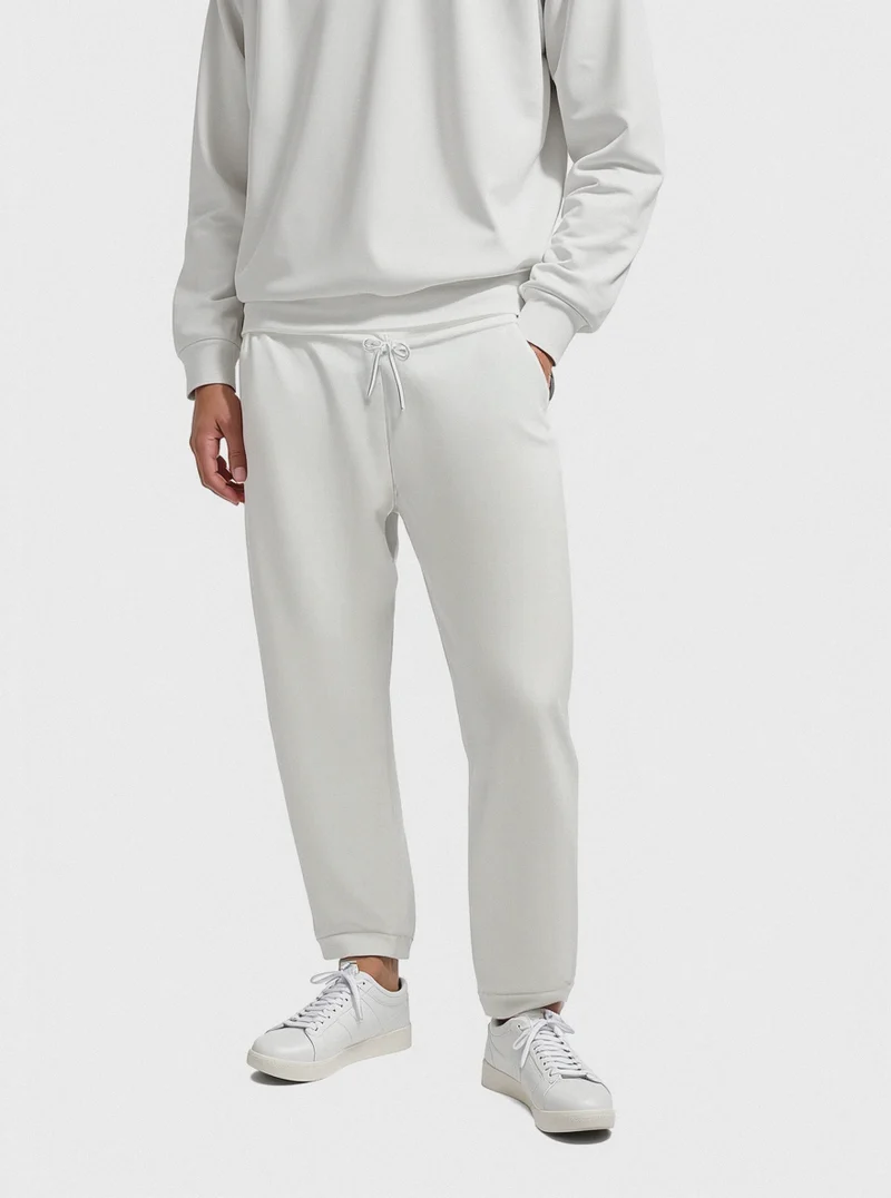 PANTALONI JOGGER BASIC IN FELPA - Bianco