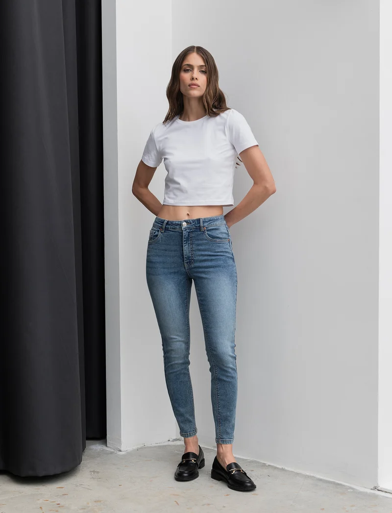 JEANS SKYNNY VITA ALTA - Denim
