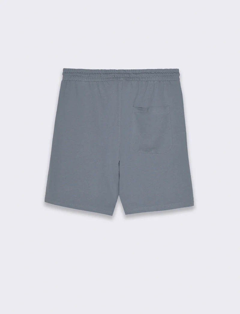 Bermuda jogger in piquet di cotone da uomo - CARTA DA ZUCCHERO