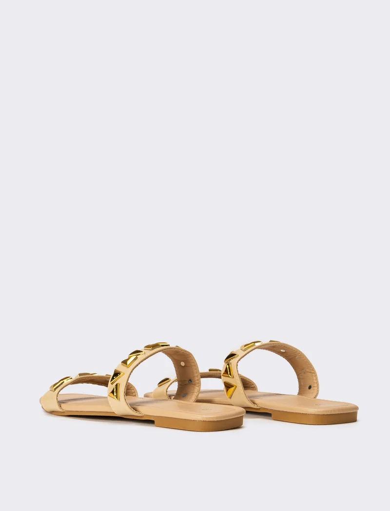 Mule da donna con borchie - Beige