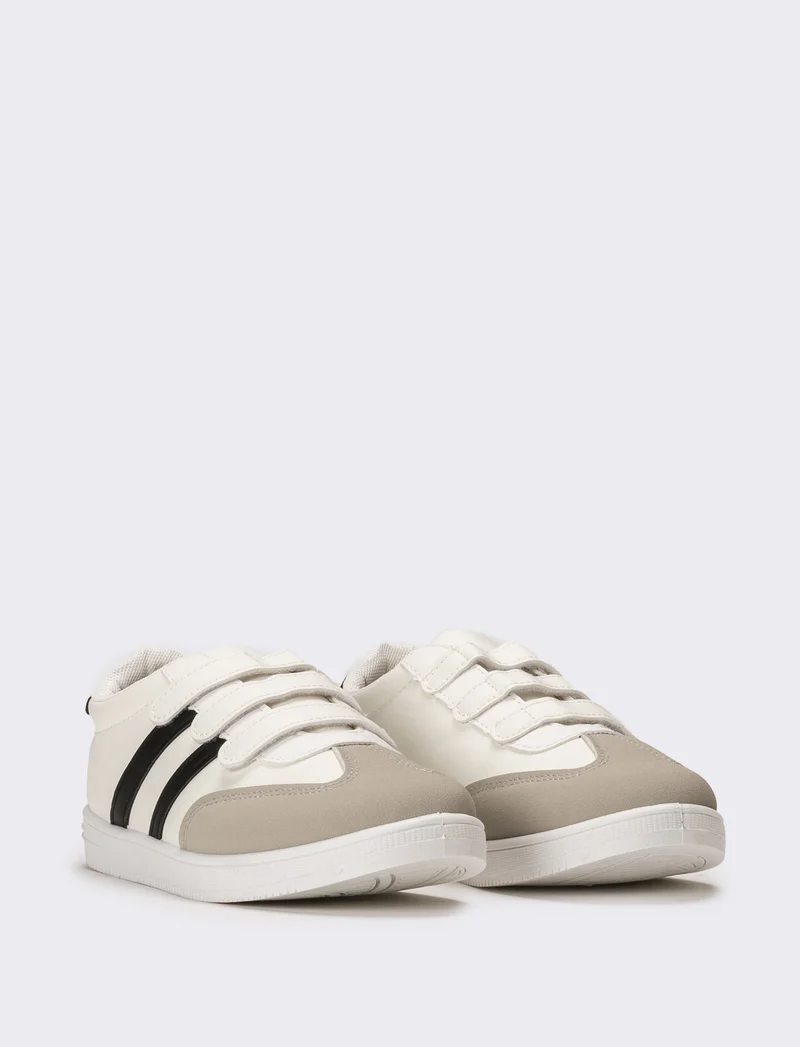 Sneakers da bambino con strappi - Bianco